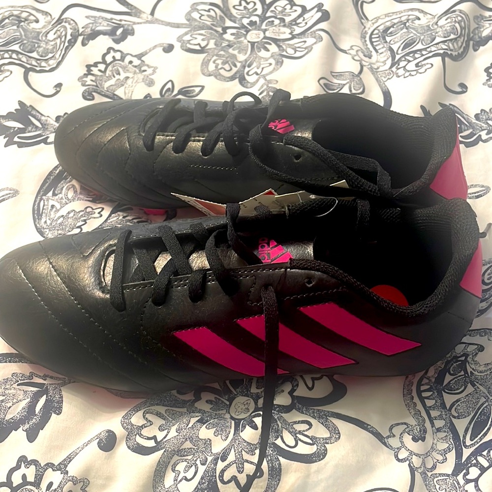 Brand new woman’s adidas soccer cleats
